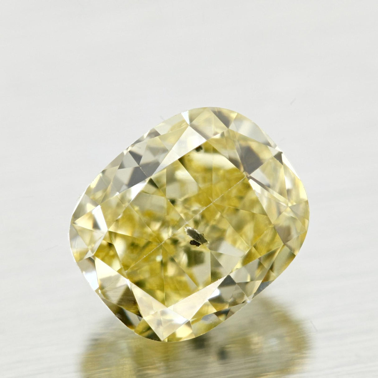0.70 carat Cushion diamond Yellow I1