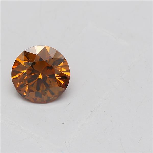 0.67 carat Round diamond Orange SI1