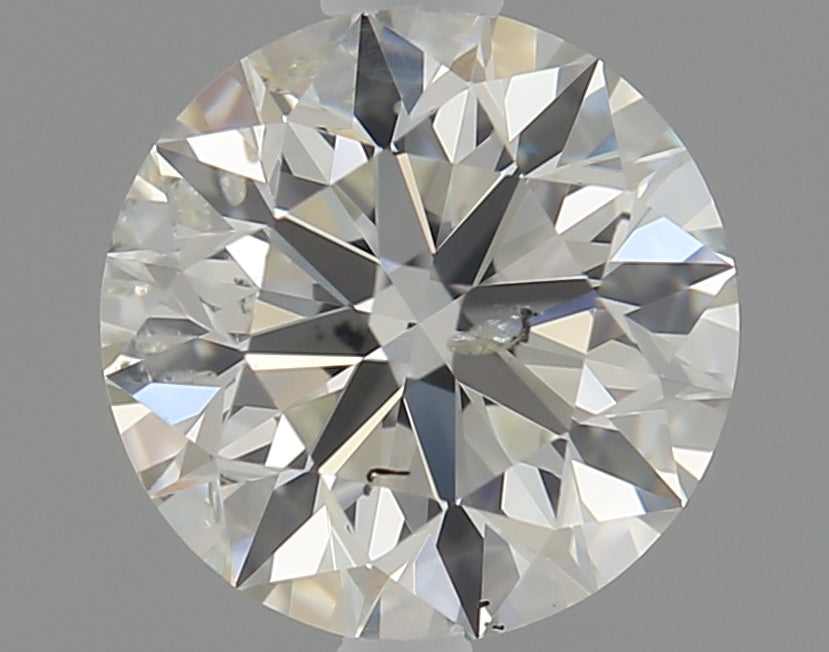 0.71 carat Round diamond J I1 Excellent