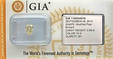 0.58 carat Pear diamond Yellow SI1