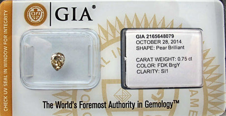 0.75 carat Pear diamond Yellow SI1