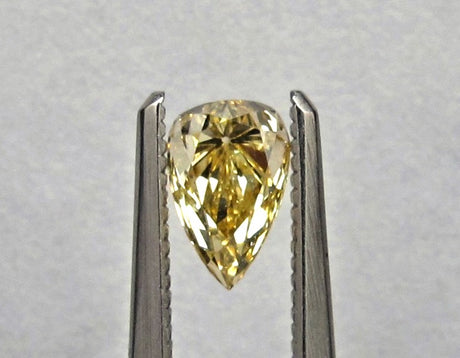 0.77 carat Pear diamond Yellow SI2