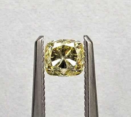 0.52 carat Cushion diamond Yellow SI2