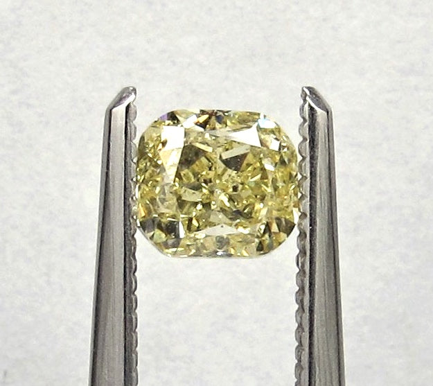 0.91 carat Cushion diamond Yellow SI2