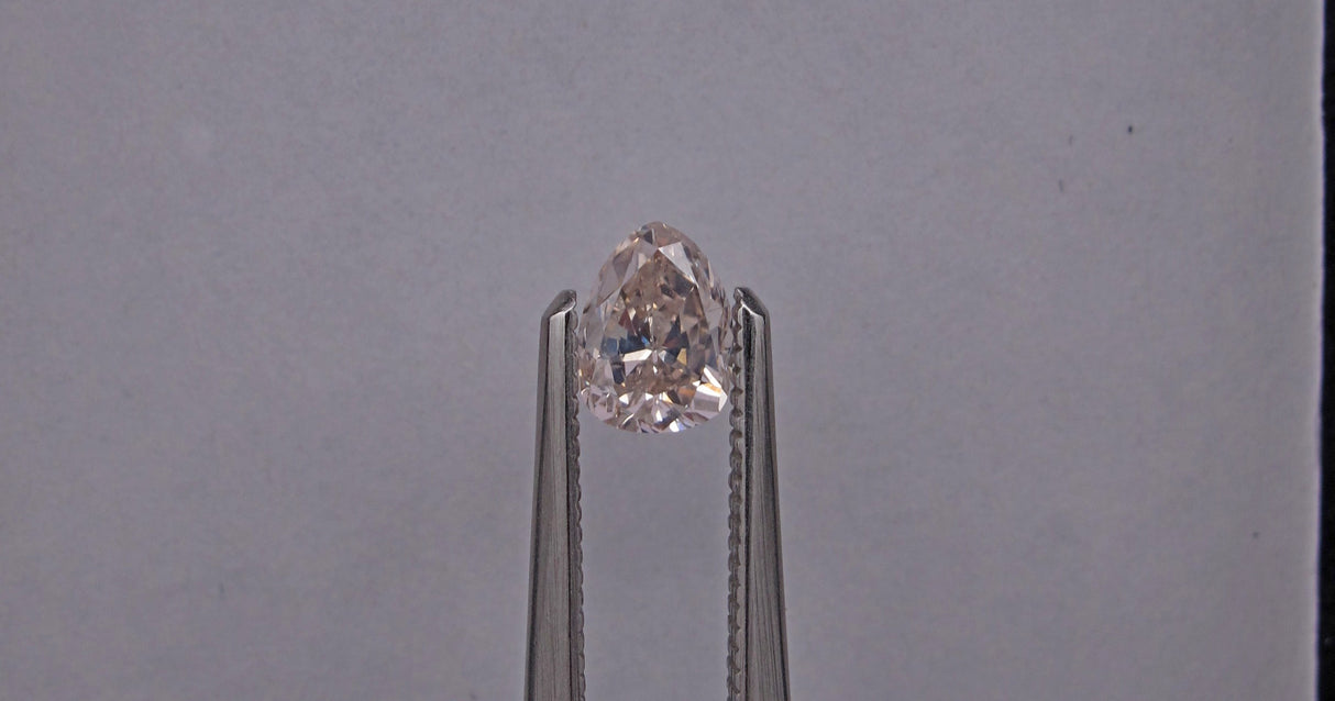 0.66 carat Pear diamond Pink SI2