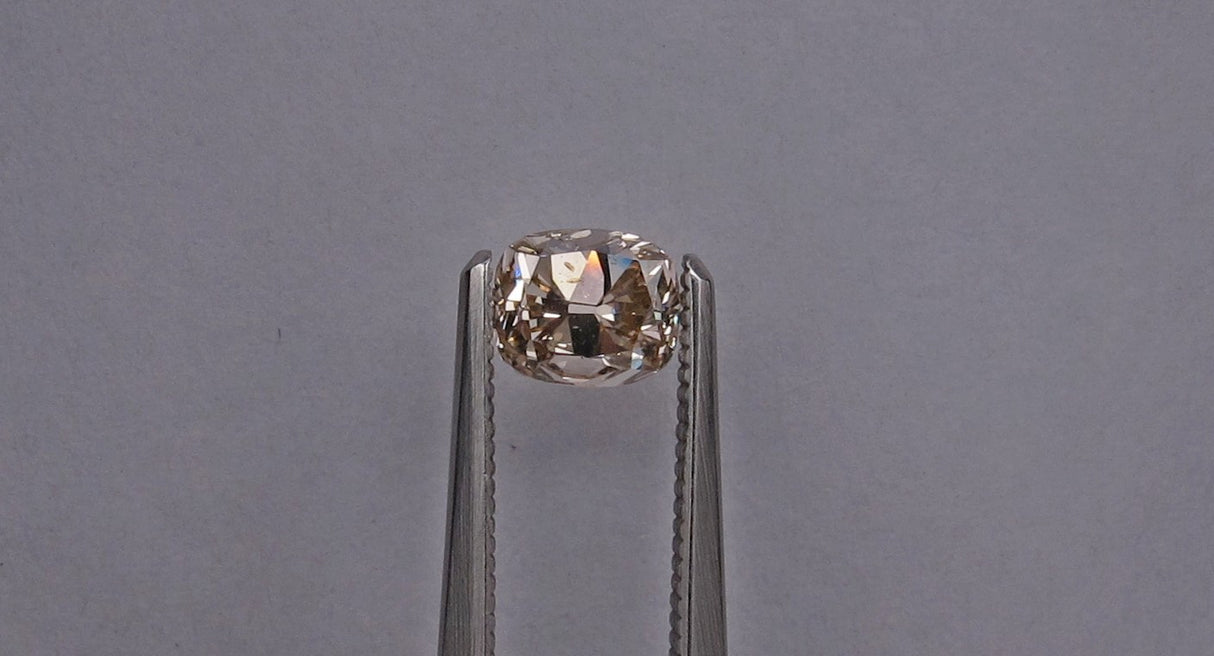 0.95 carat Cushion diamond Brown SI2