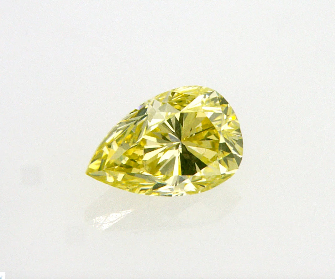 0.65 carat Pear diamond Yellow SI1