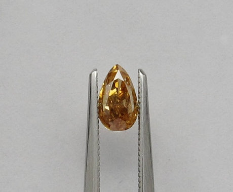 0.91 carat Pear diamond Yellow SI2