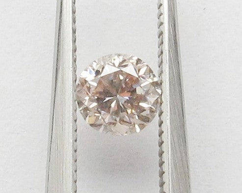 0.53 carat Round diamond Brown SI2