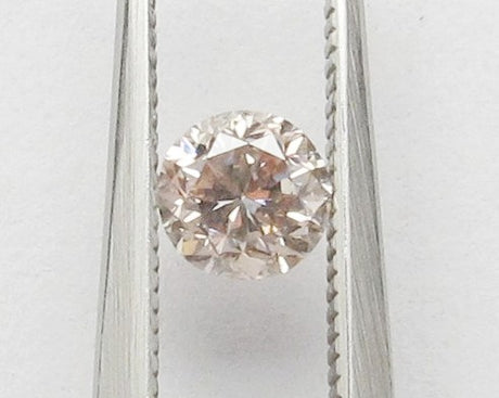0.53 carat Round diamond Brown SI2