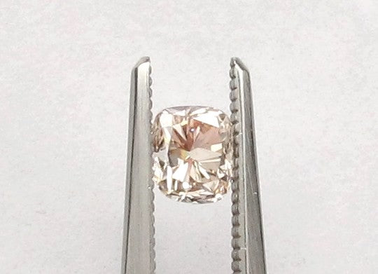 0.60 carat Cushion diamond Brown SI2