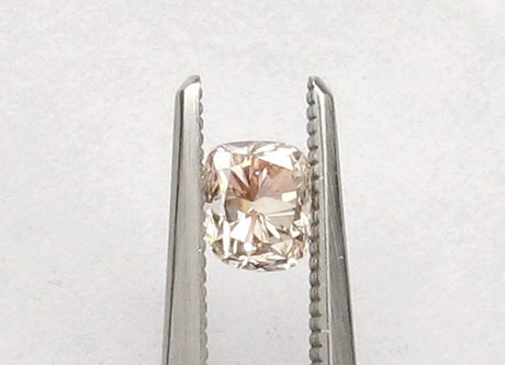 0.60 carat Cushion diamond Brown SI2