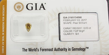 0.63 carat Pear diamond Yellow SI1