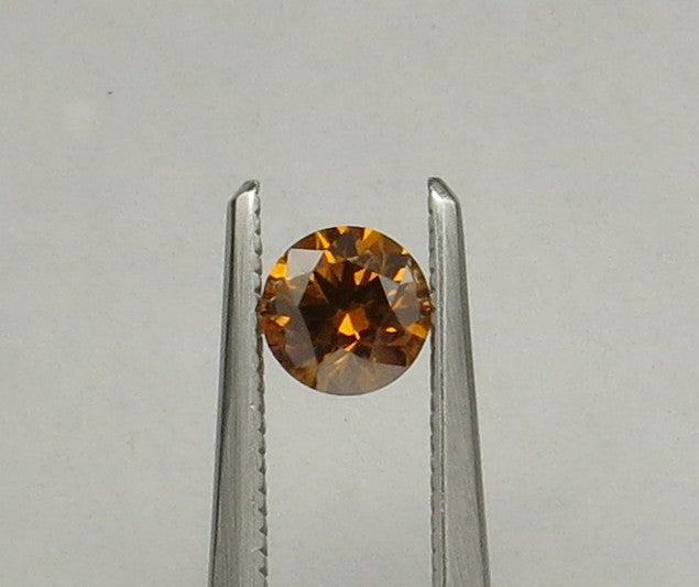 0.53 carat Round diamond Orange SI2