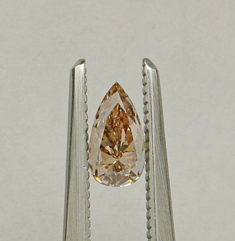 0.50 carat Pear diamond Brown SI1