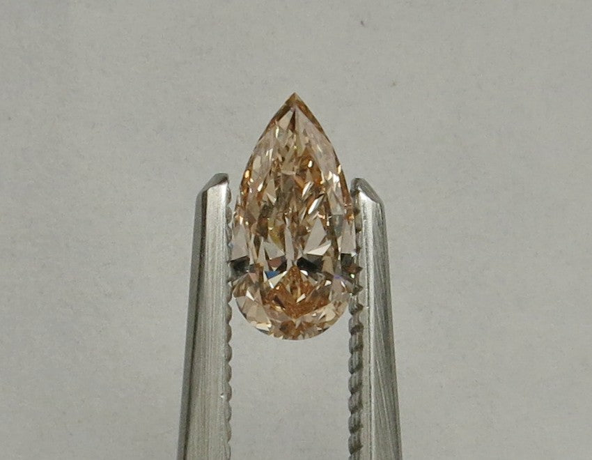 0.46 carat Pear diamond Orange SI1