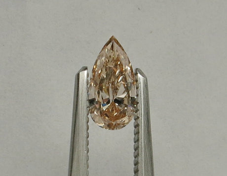 0.46 carat Pear diamond Orange SI1