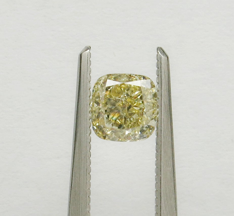 0.84 carat Cushion diamond Yellow VS2