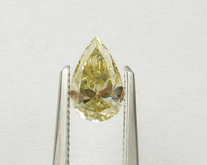 0.90 carat Pear diamond Yellow SI2