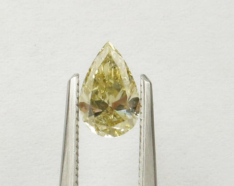 0.90 carat Pear diamond Yellow SI2