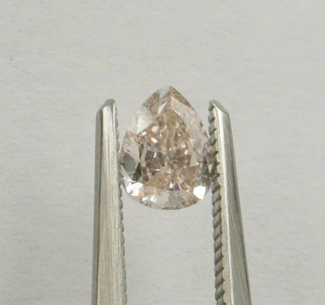 0.50 carat Pear diamond Pink SI2