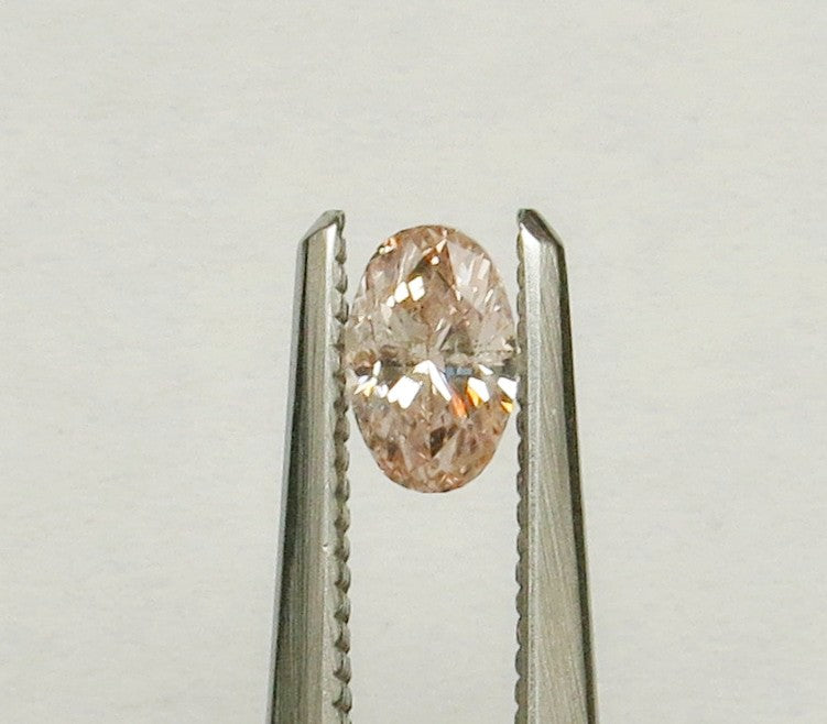 0.33 carat Oval diamond  Pink SI2