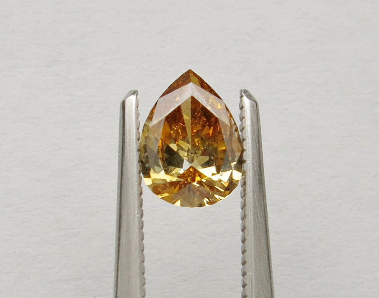 0.76 carat Pear diamond Brown VS2