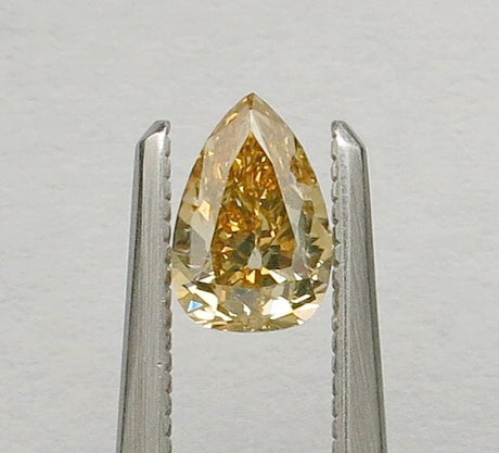 0.58 carat Pear diamond Brown VS2