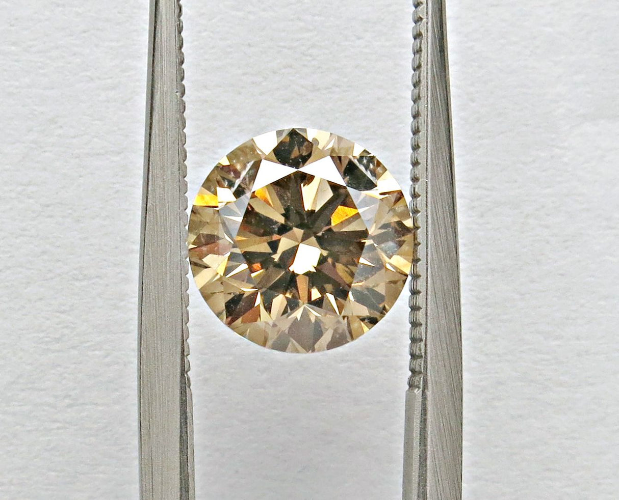 2.56 carat Round diamond Brown SI2