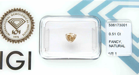 0.51 carat Triangle diamond Brown VS1