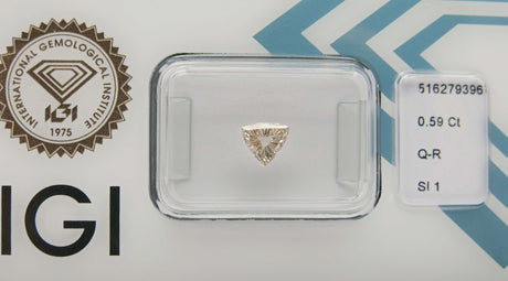 0.59 carat Triangle diamond Brown SI1