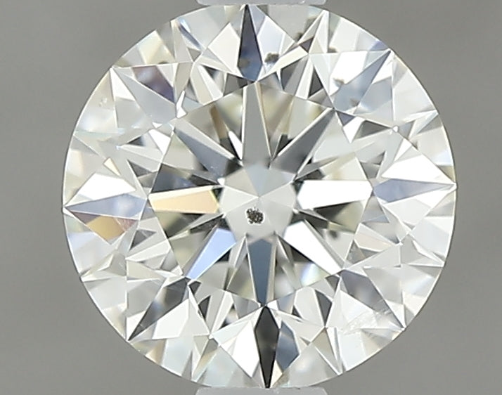 0.73 carat Round diamond J I1 Excellent
