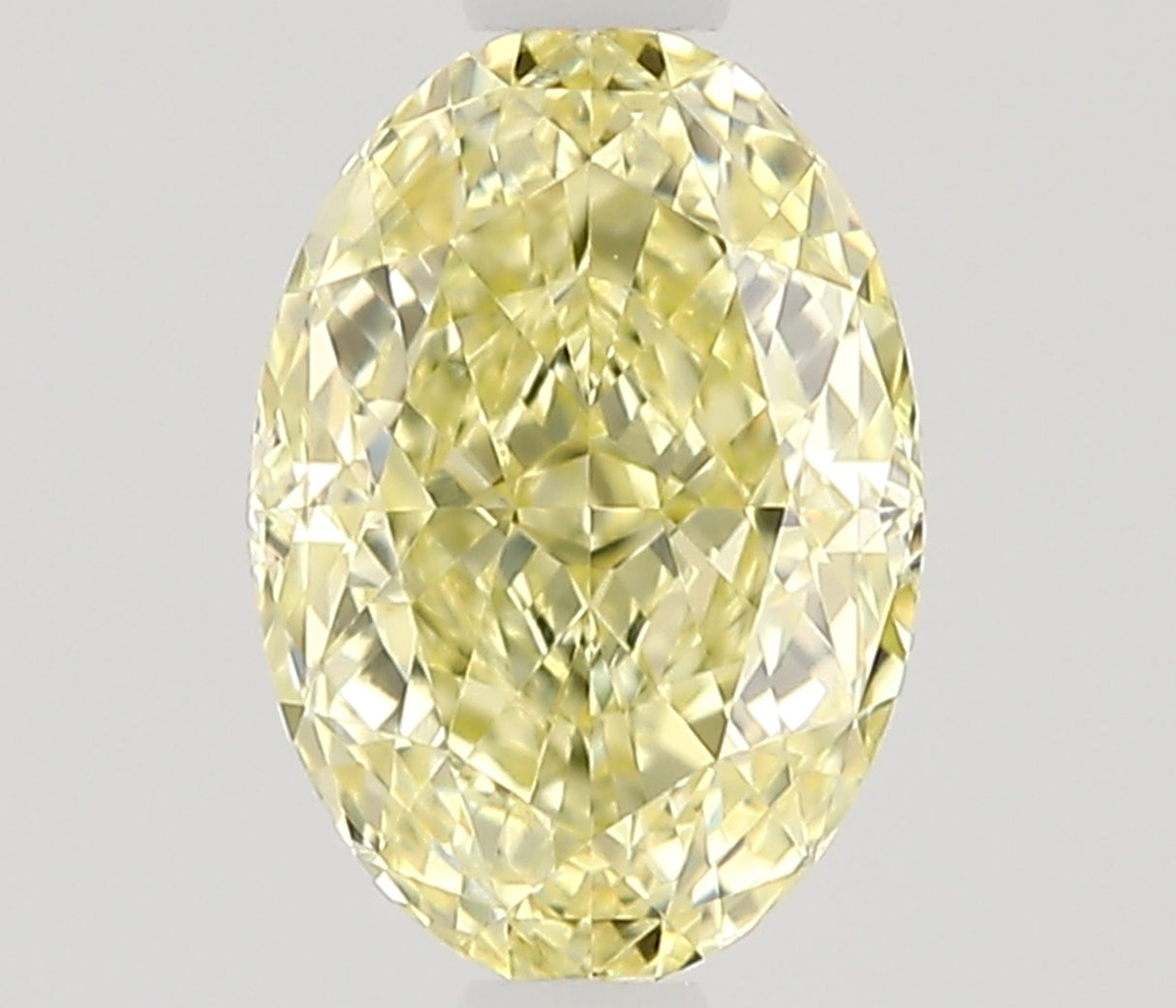 0.50 carat Oval diamond  Yellow VVS1 Excellent