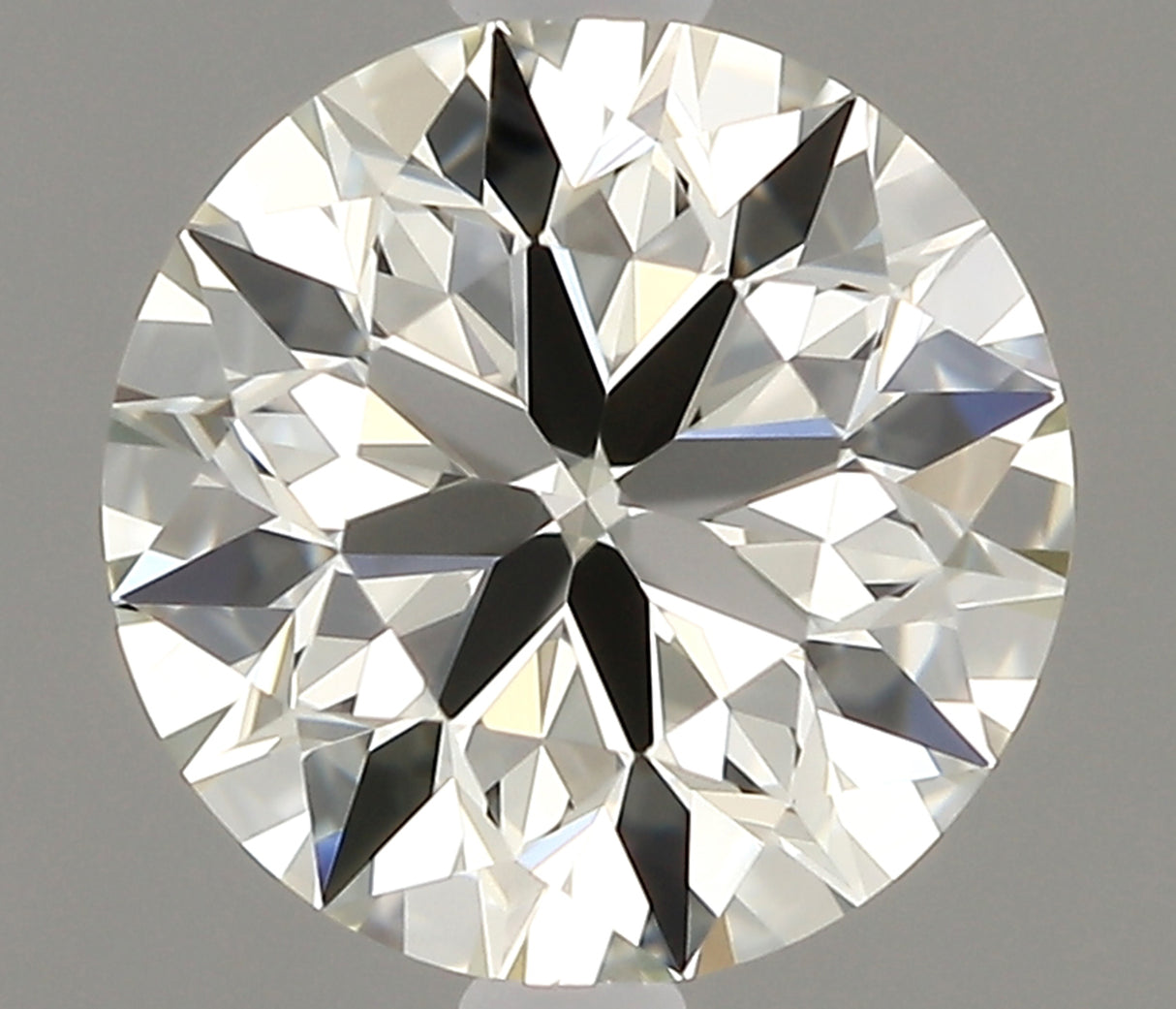 0.79 carat Round diamond J  IF Excellent