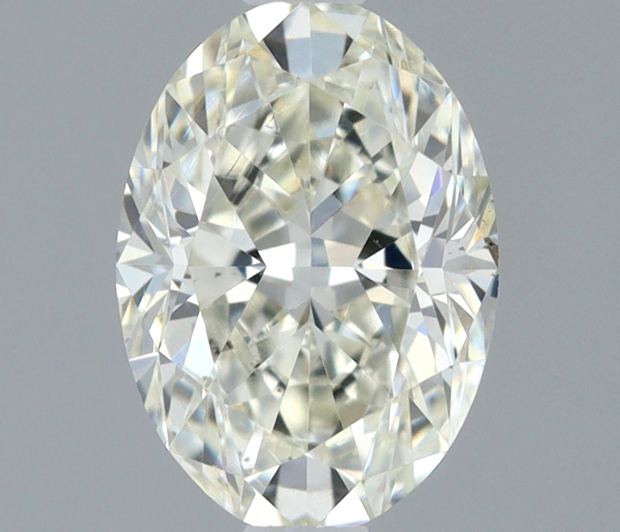 0.39 carat Oval diamond J  VS2 Excellent