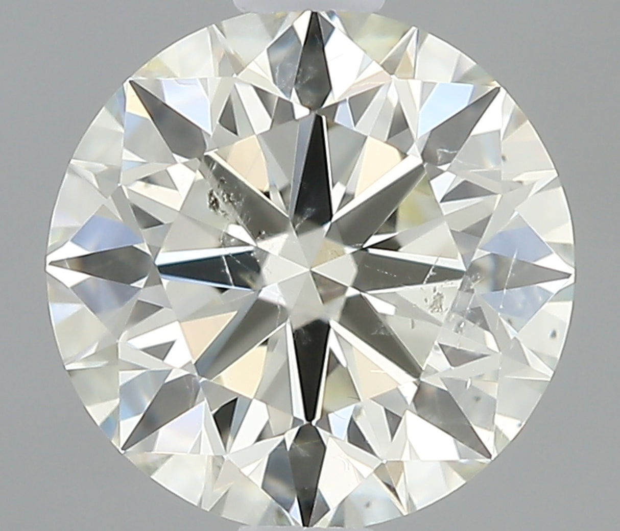 0.60 carat Round diamond J  SI1 Excellent