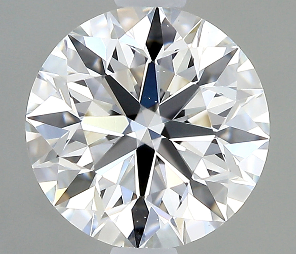 0.67 carat Round diamond E  VS2 Excellent