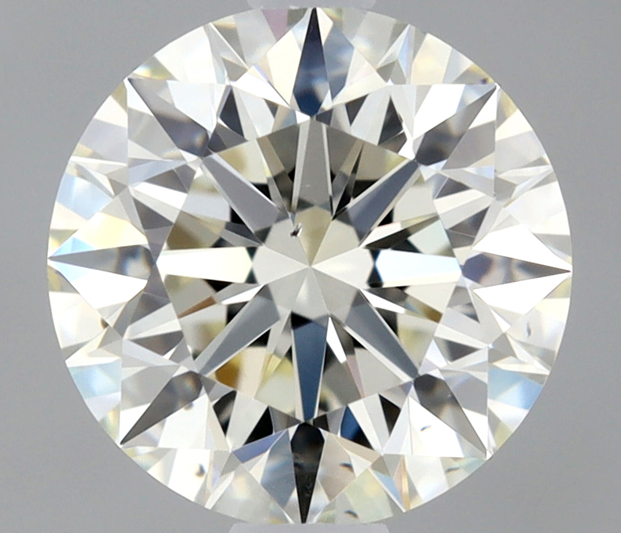 0.90 carat Round diamond J  VS2 Excellent