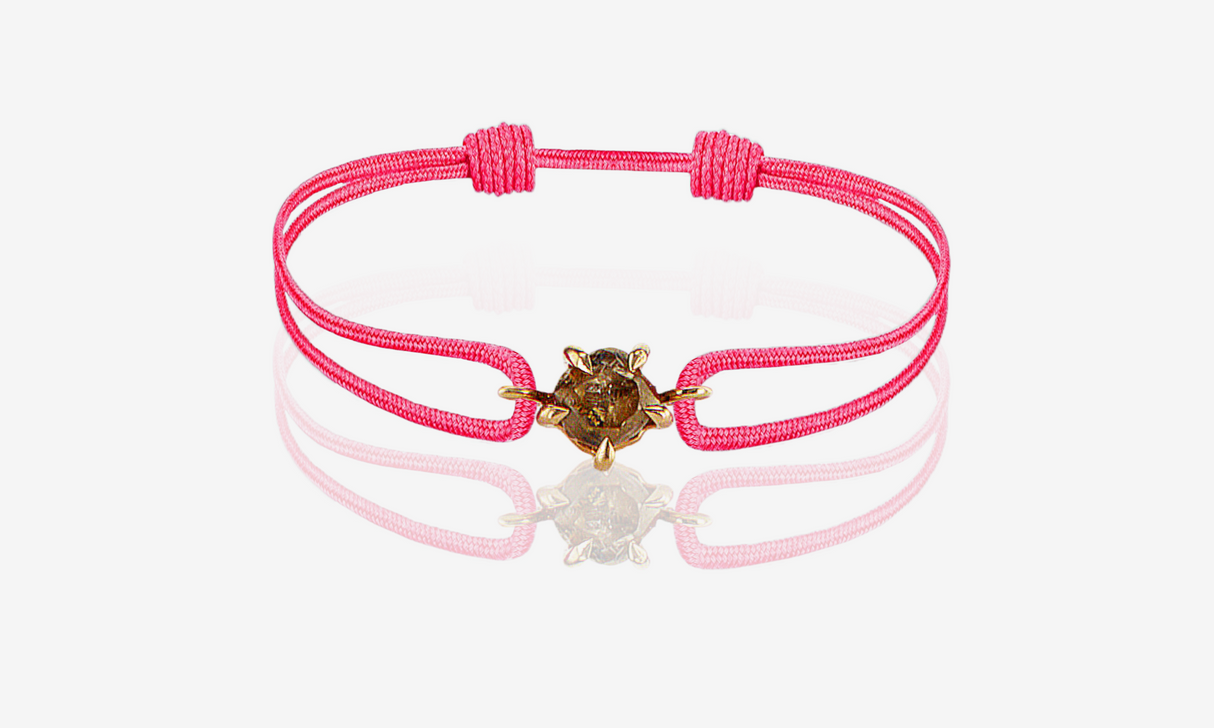 Natural Yellow Rough Diamond 0.65 carat. Yellow gold. Fushia cord bracelet