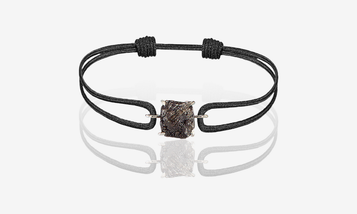 Natural Rough Diamond 2.12 carat. White gold. Black cord bracelet