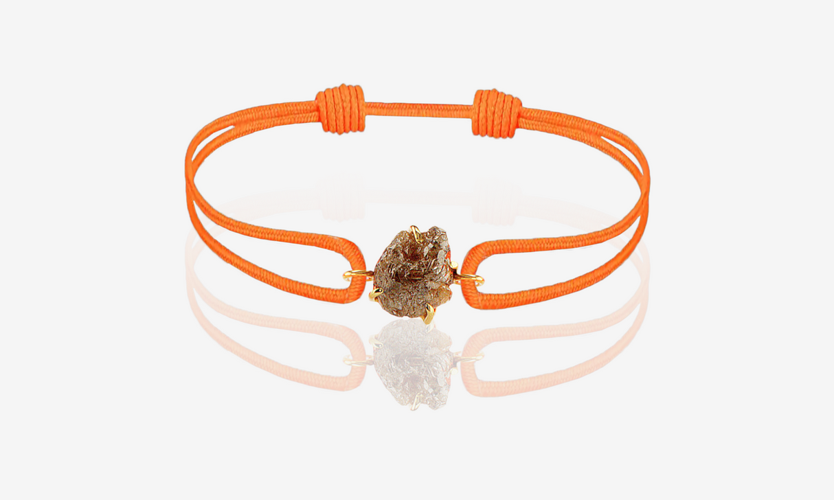 Natural Rough Diamond 2.48 carat. Yellow gold. Orange cord bracelet