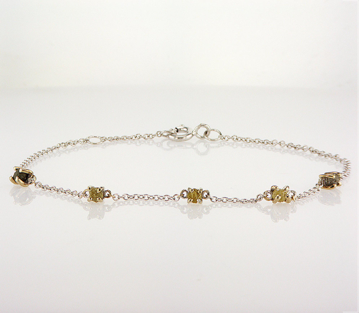 Natural Fancy Color Rough Diamonds 0.41 carat. White gold bracelet