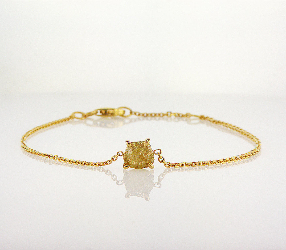 Natural Yellow Rough Diamond 0.53 carat. Yellow gold bracelet