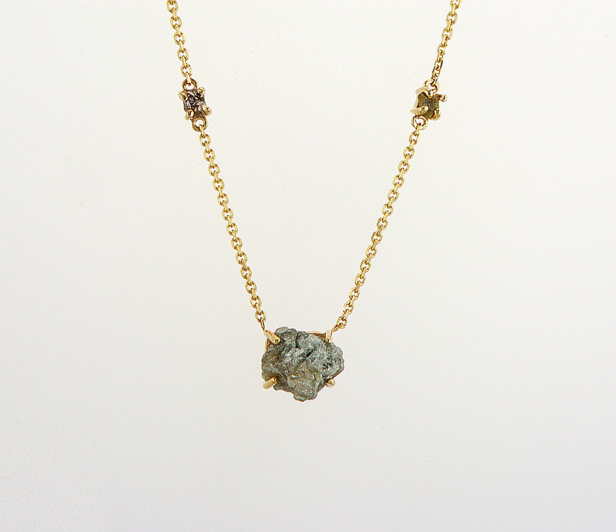 Natural Rough Diamond 1.90 carat with 0.15 small diamonds. Yellow gold necklace