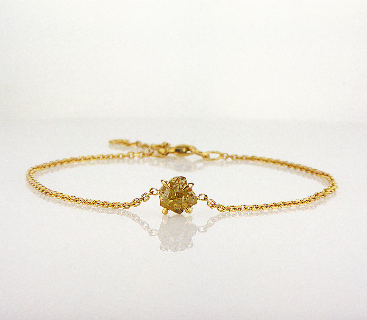 Natural Yellow Rough Diamond 0.65 carat. Yellow gold bracelet