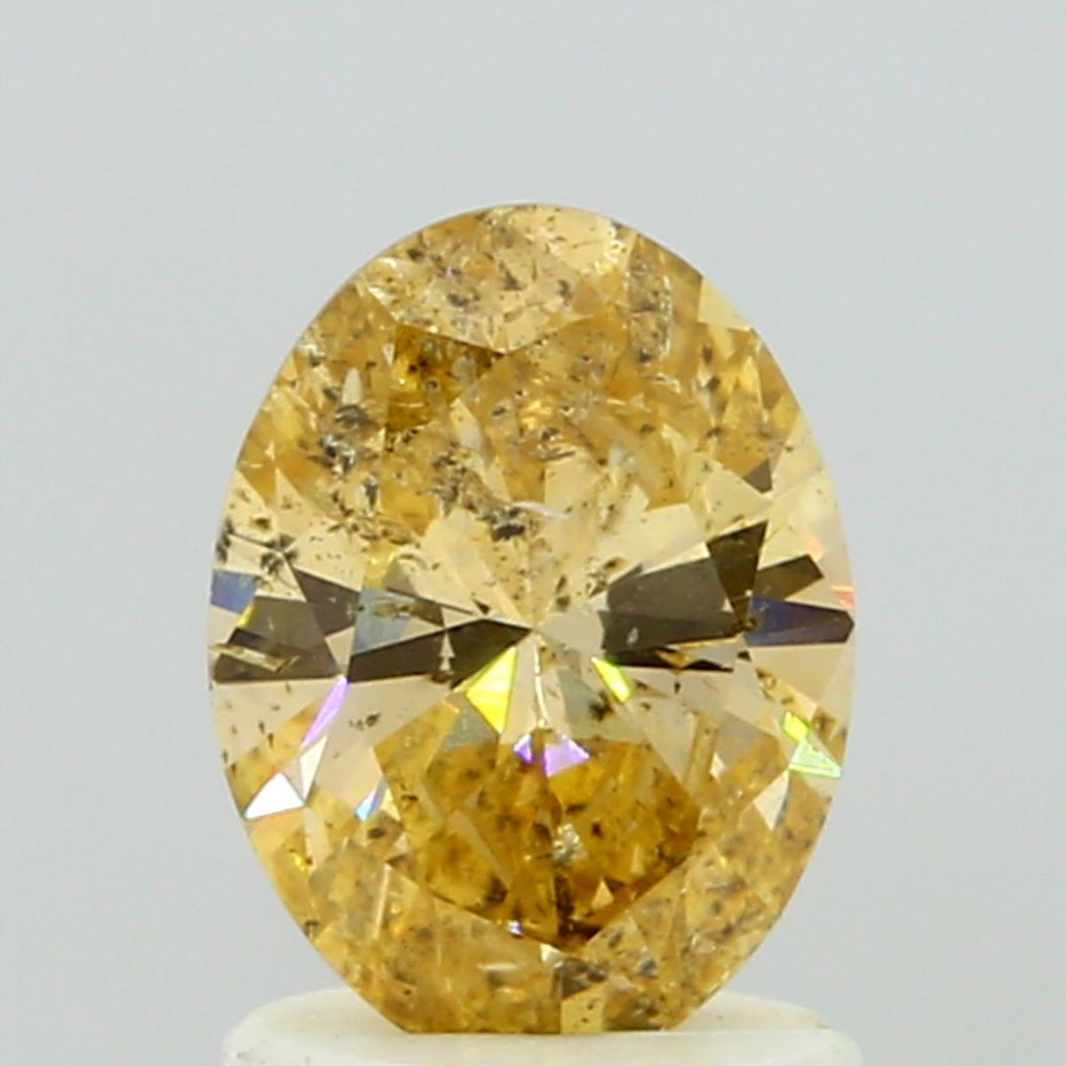 1.08 carat Oval diamond  Orange I1