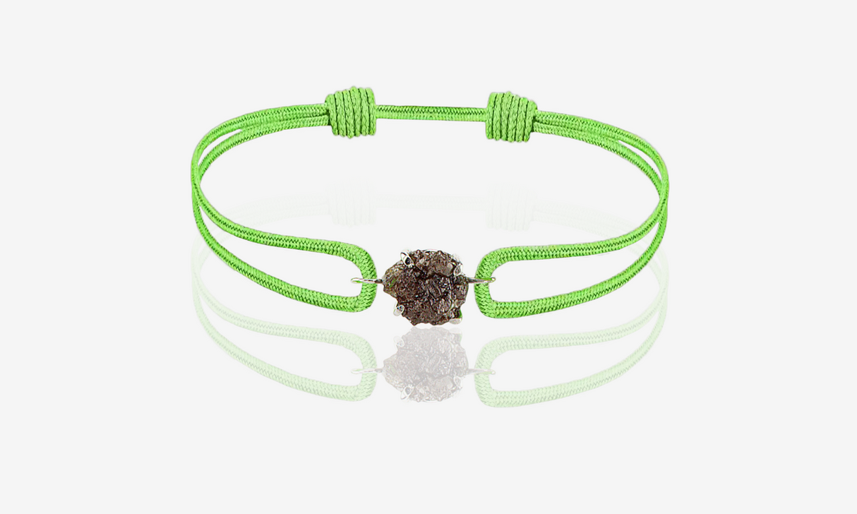 Natural Rough Diamond 1.86 carat. White gold. Green cord bracelet