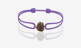 Natural Rough Diamond 3,01 carat. White gold. Purple cord bracelet