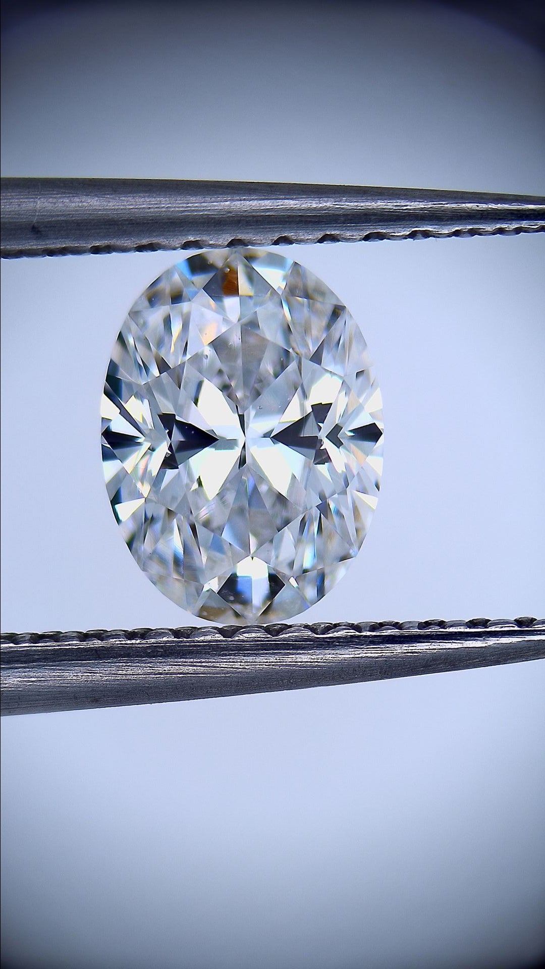 0.91 carat Oval diamond E  VS2