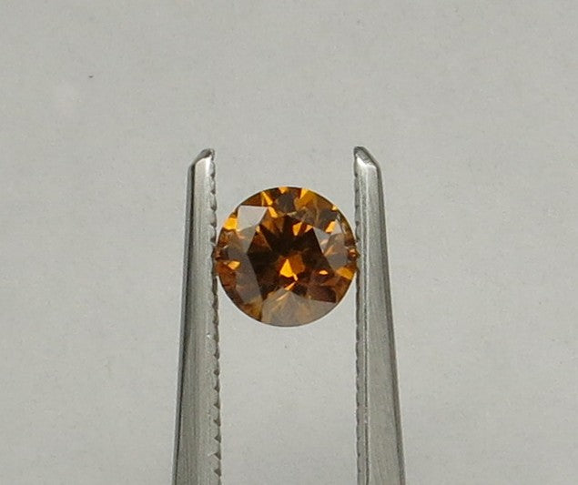 0.53 carat Round diamond  Orange SI2